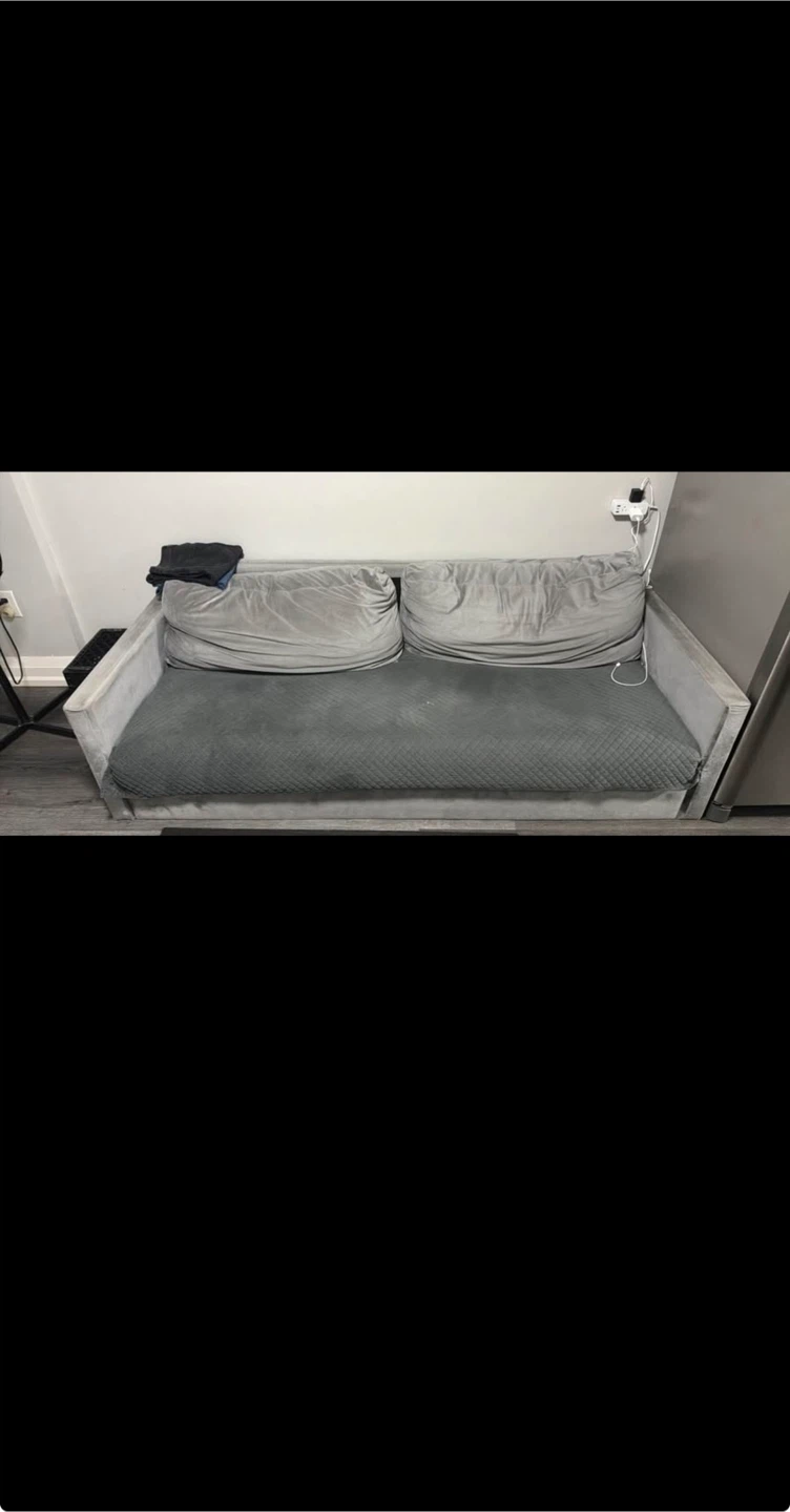 Grey Sofa with Two Pillows
