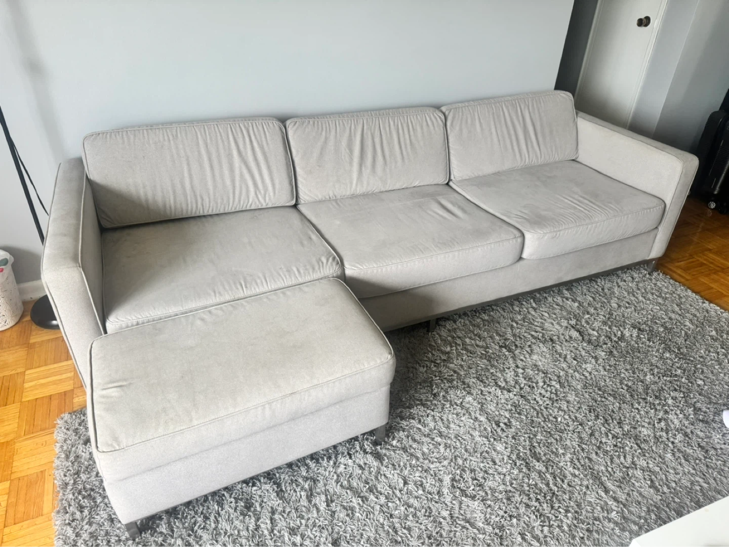 Light Gray Sectional Sofa with Ottoman