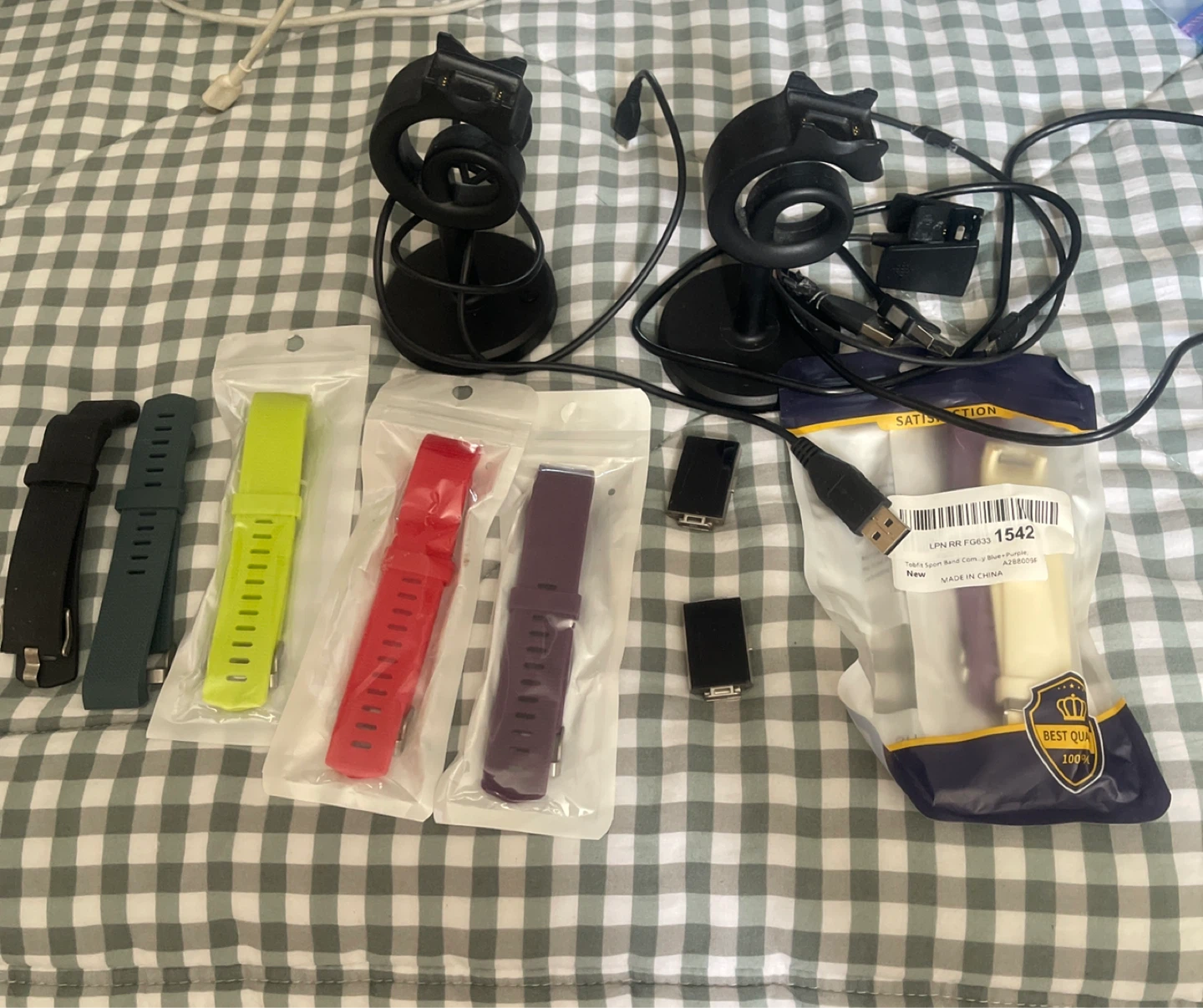 Fitbit charge three, four wristbands and chargers
