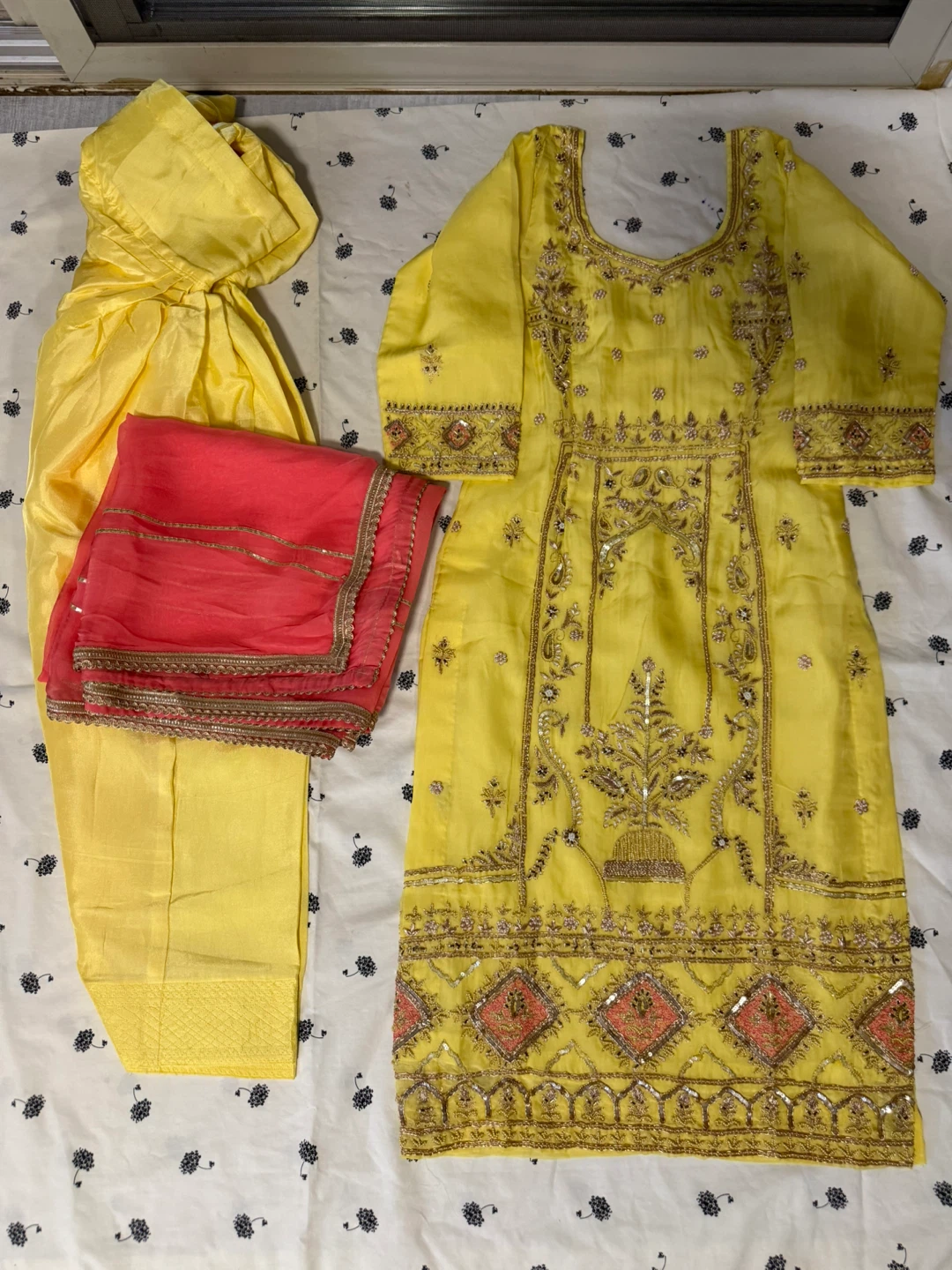 Yellow Embroidered Salwar Kameez with Pink Dupatta