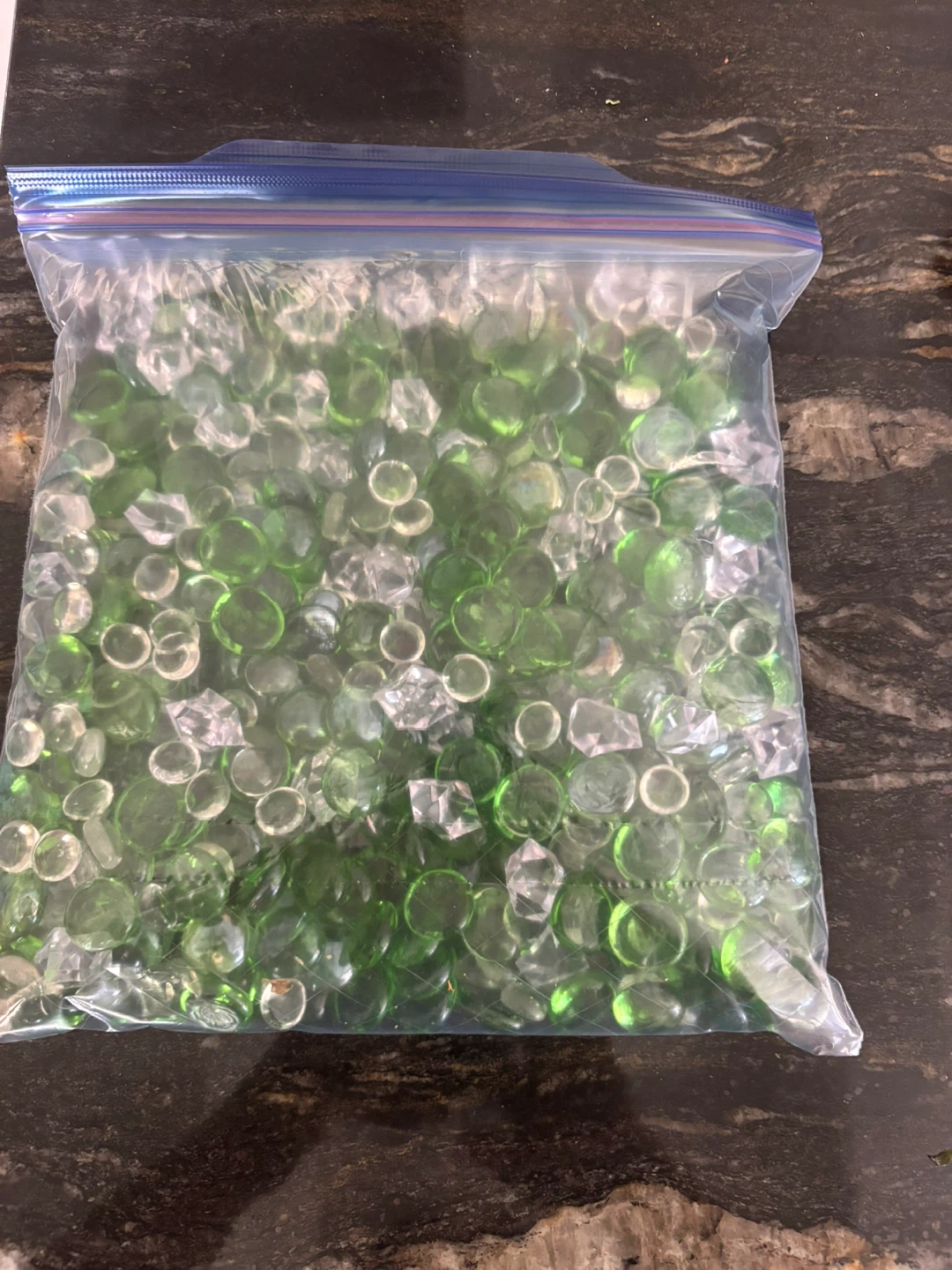Bag of Green and Clear Glass Gems