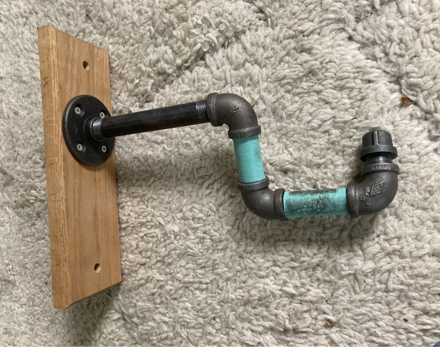 Industrial pipe and wood wall bike mount