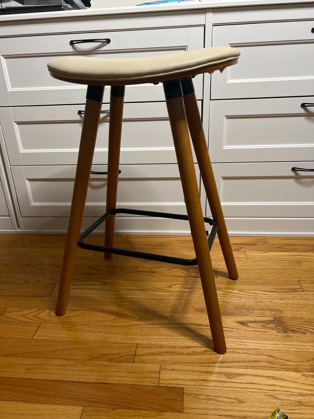 Cream Saddle Stool with Wooden Legs
