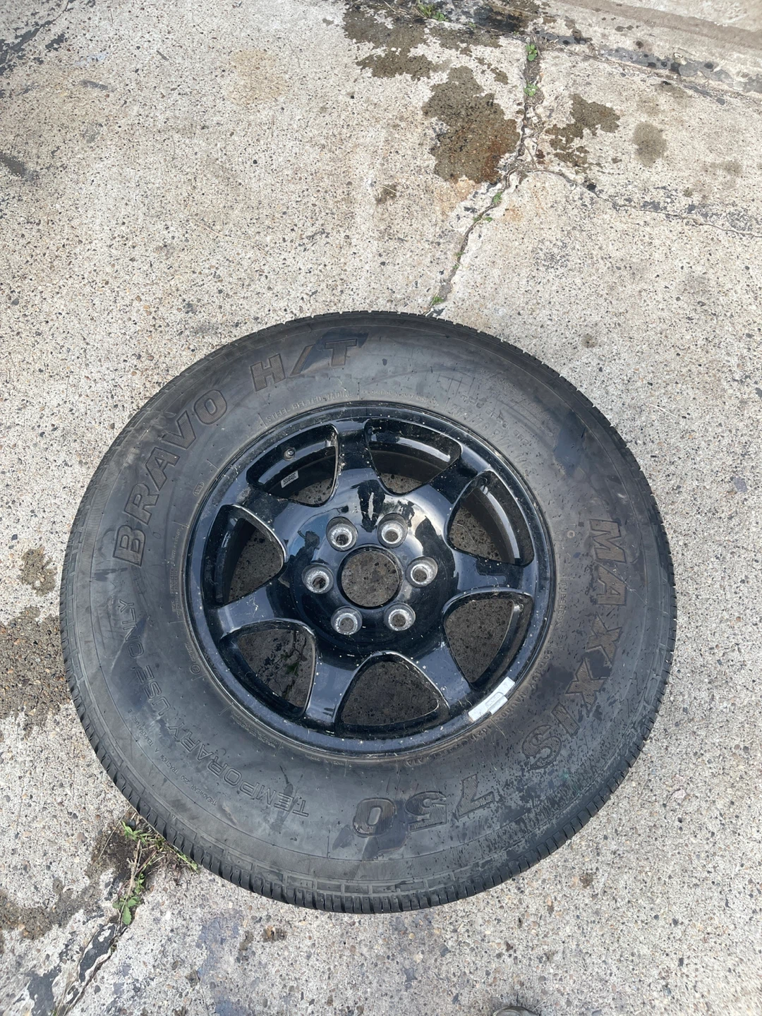 265/70 R17 Tire with Black Rim