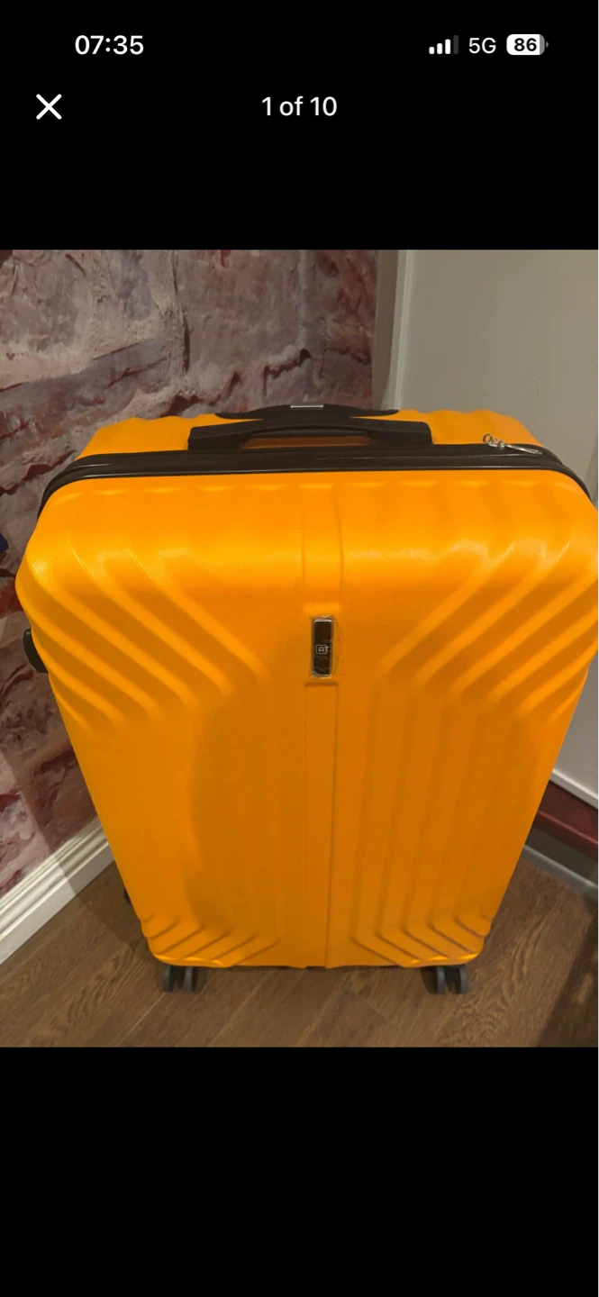 American Tourister Orange Hardshell Suitcase
