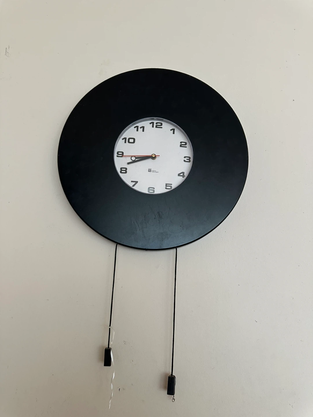 Black Round Wall Clock with Pendulum