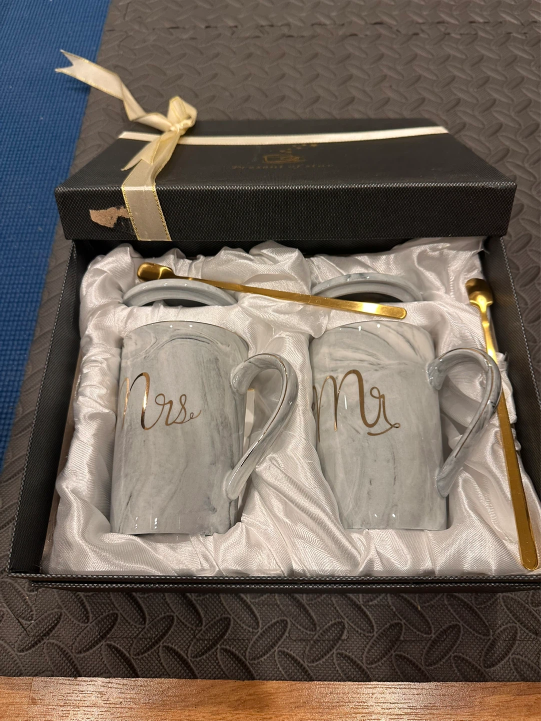Elegant tea/coffee cups with golden spoons