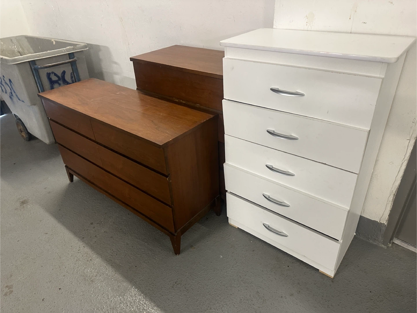 Two dressers: one white 5-drawer, one wood 3-drawer