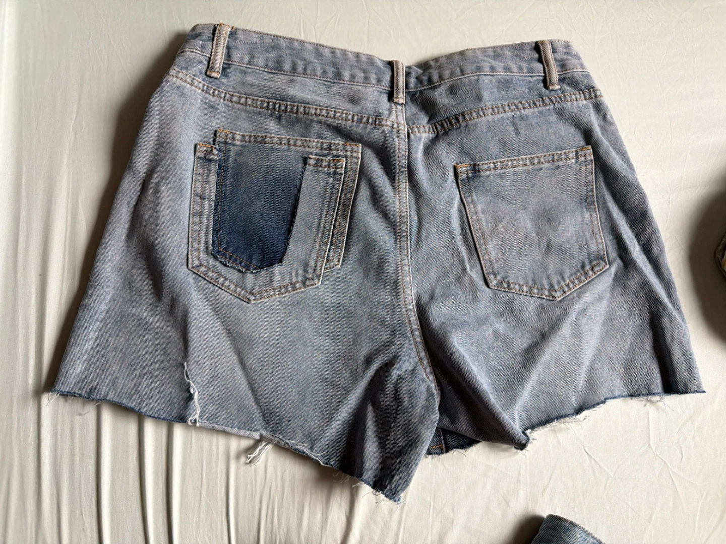 Light Wash Distressed Denim Shorts - photo 3