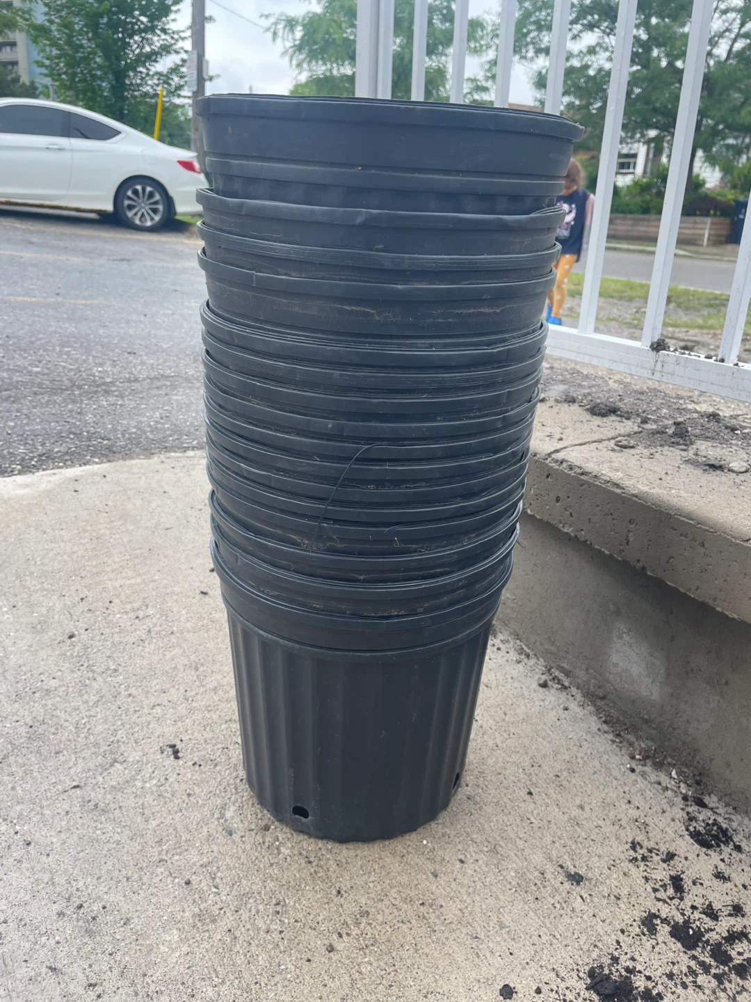 Stack of 16 Black Plastic Plant Pots (price for all)