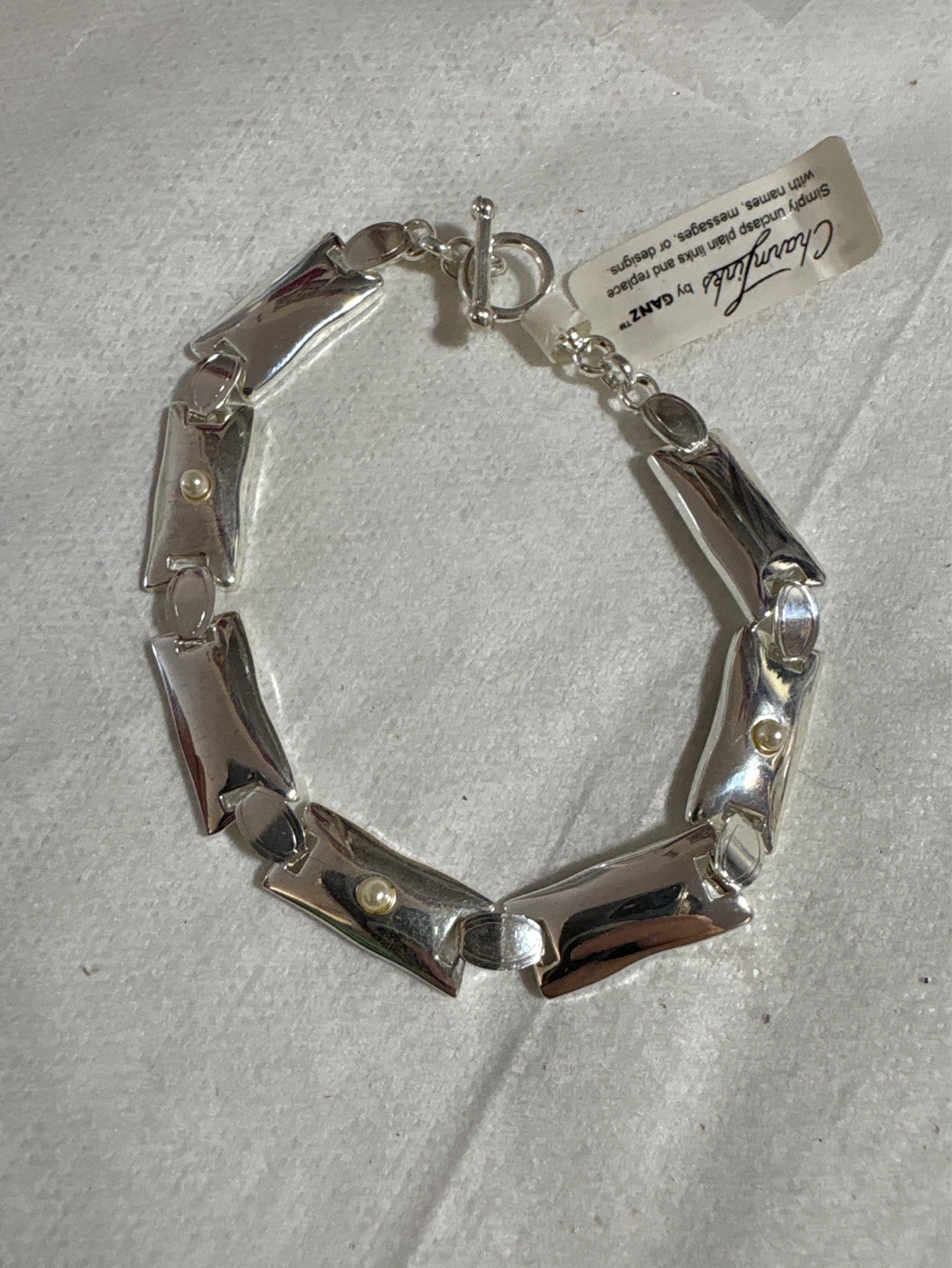 GANZ Charmlinks Silver Tone Bracelet with Pearl Accents.