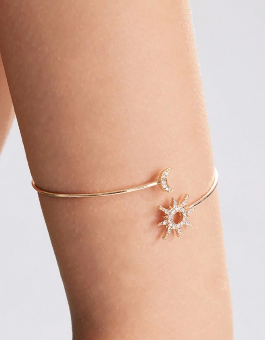 Gold-tone Sun and Moon Arm Bangle