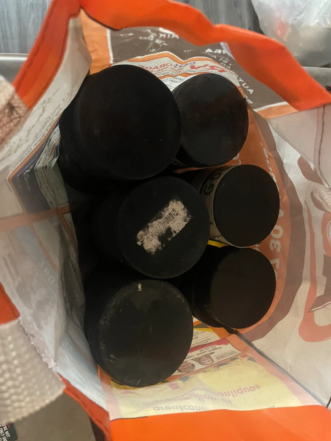 40 Black Hockey Pucks for only $50