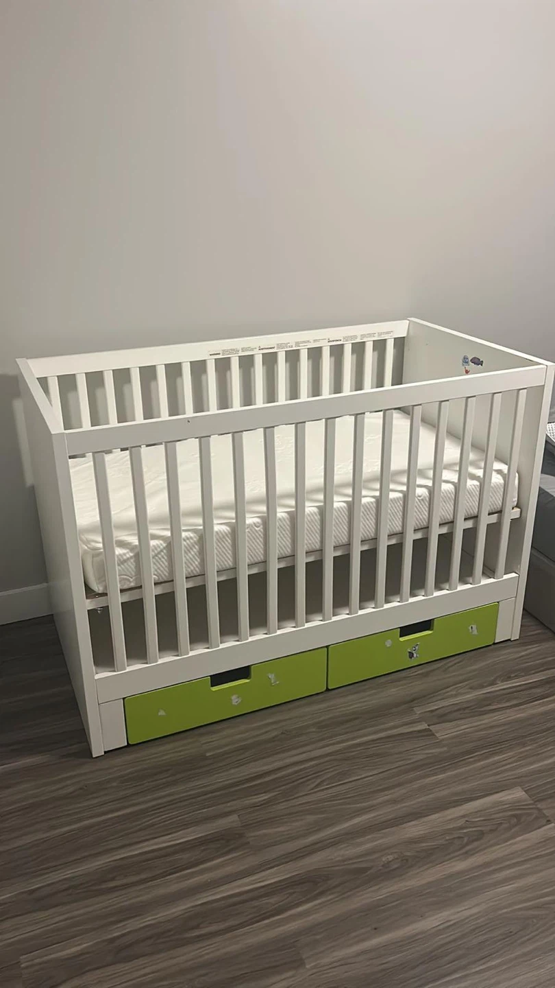 White Crib with Green Drawers