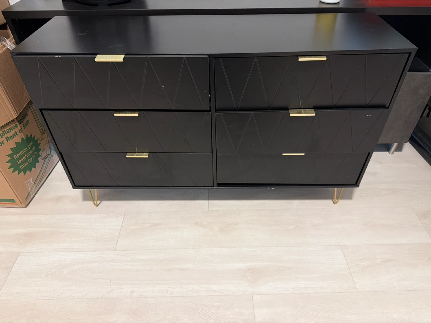 Black Dresser with Geometric Design