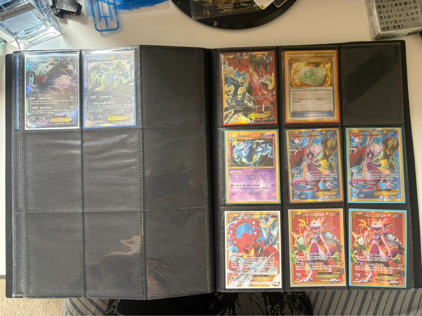 Assorted Pokémon Trading Cards in Binder