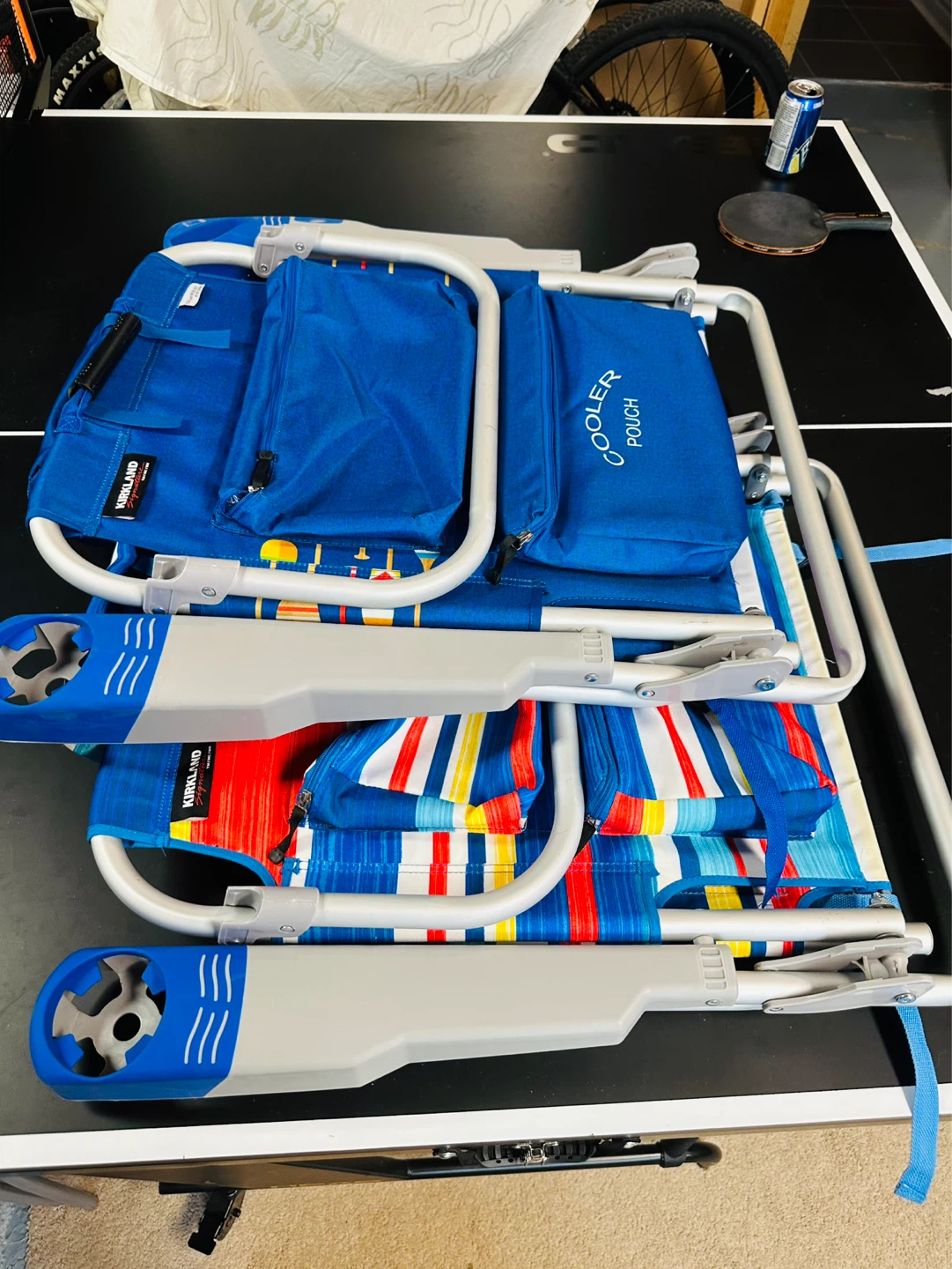A pair of Kirkland Signature Beach Chair with Cooler Pouch