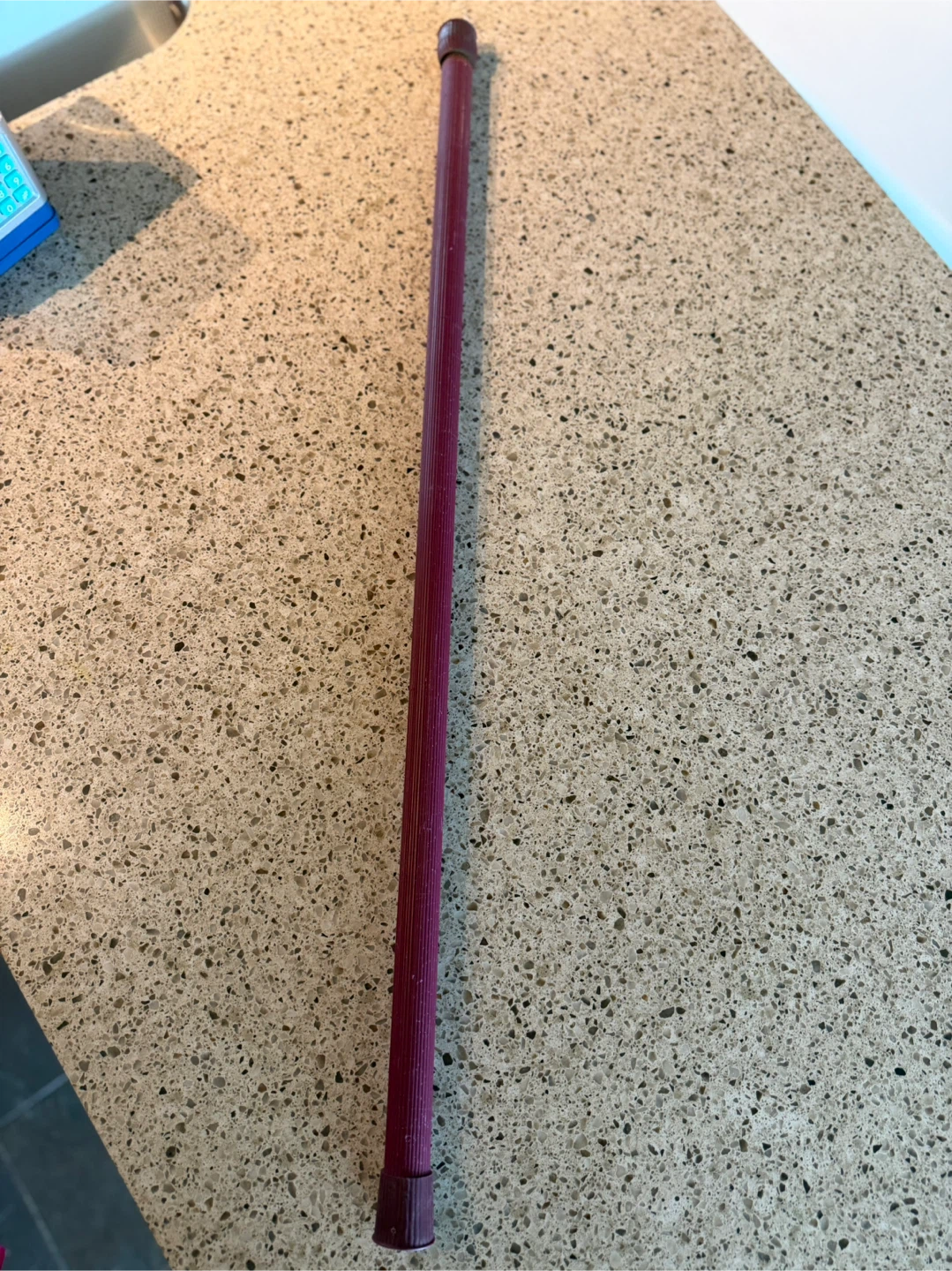 Red curtain rod