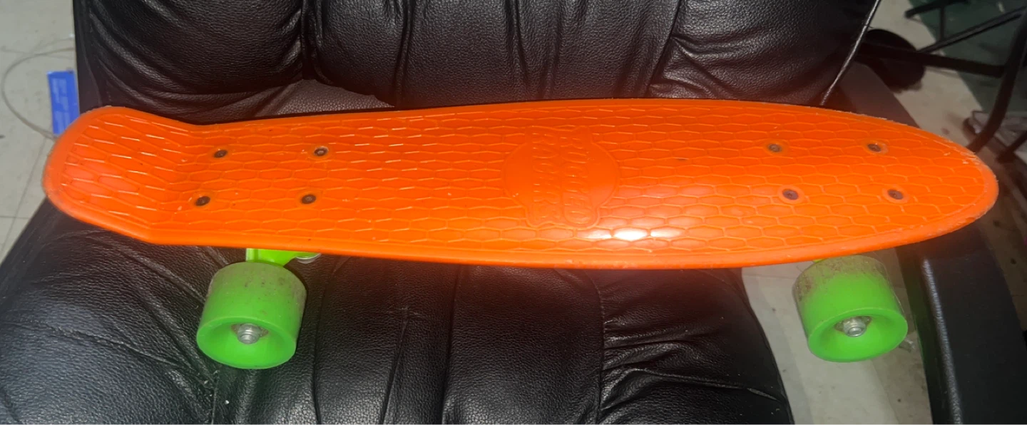 Rugged Racers Orange Skateboard