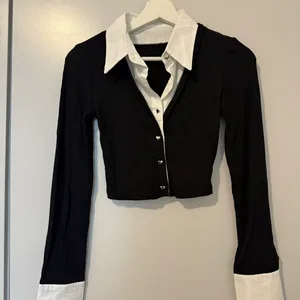 Black and white collared long sleeve shirt