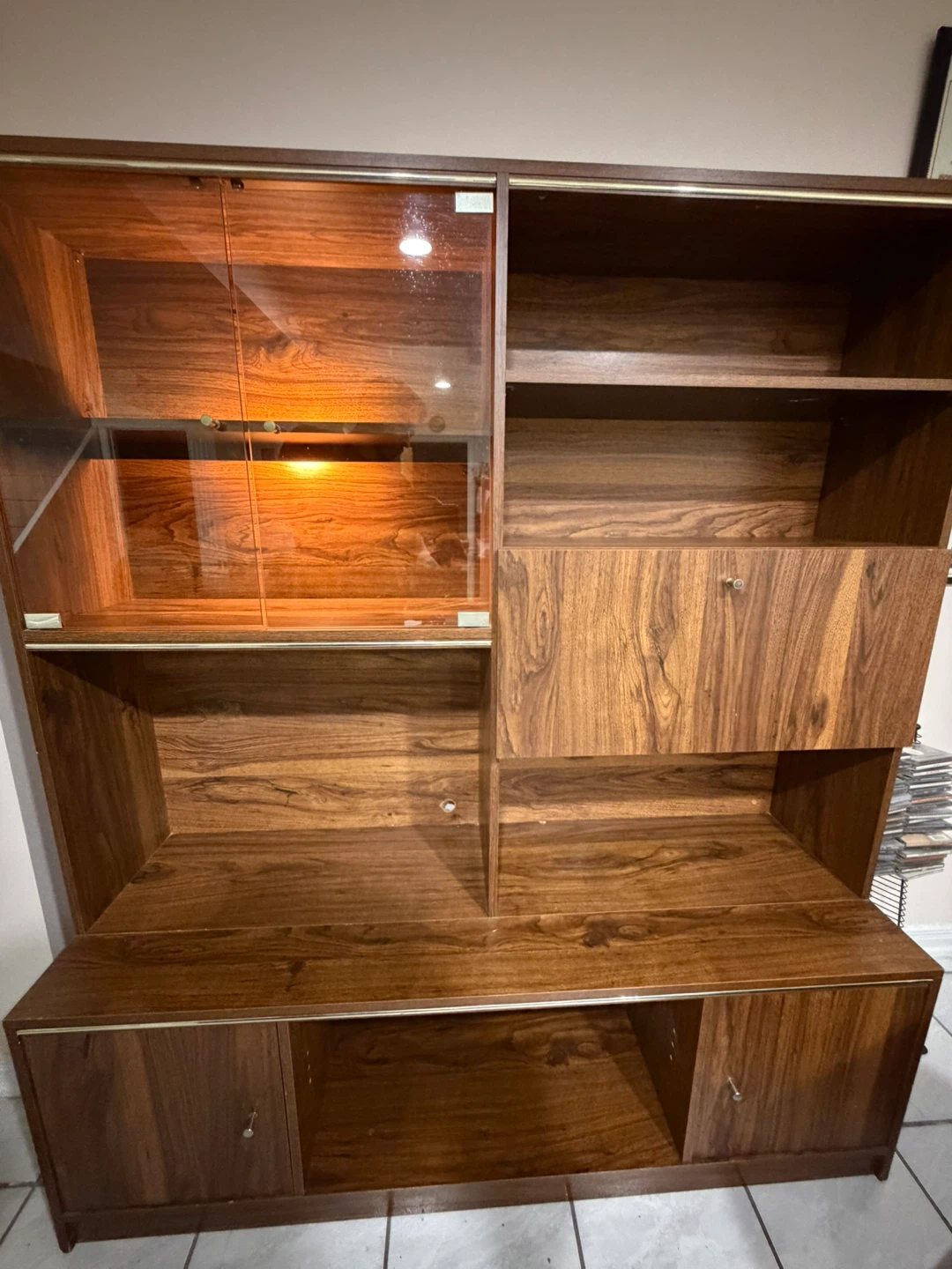 Wooden display cabinet with glass doors
