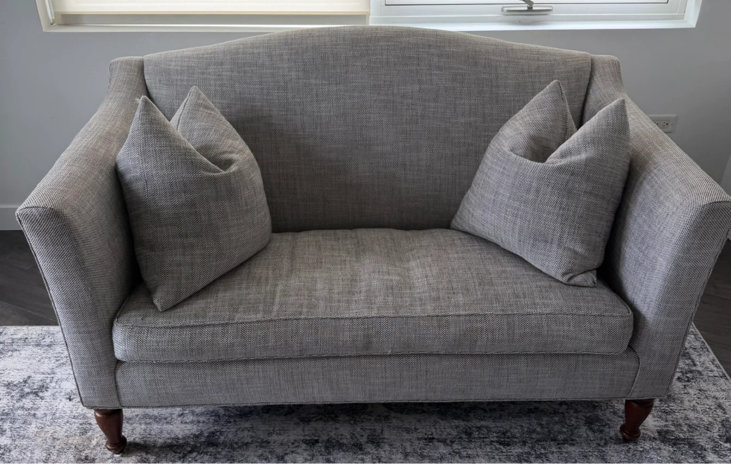 Gray Upholstered Loveseat with Accent Pillows