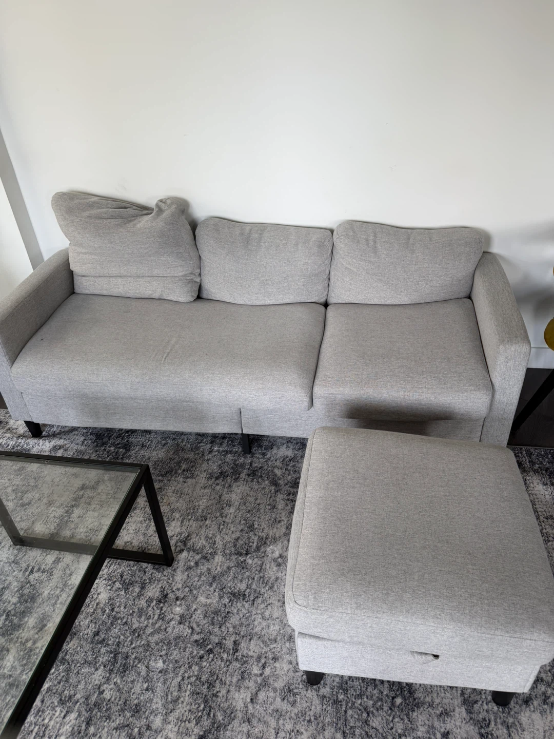 L-shaped couch with storage ottoman