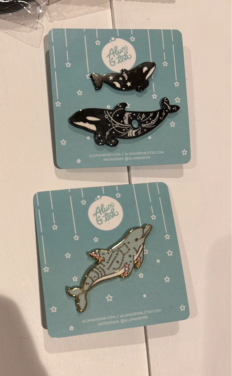 Orca and Dolphin Enamel Pins