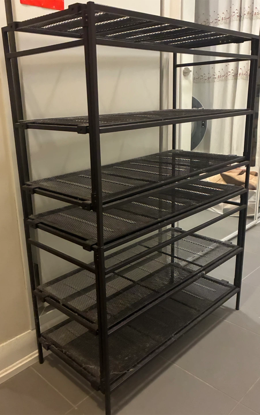 Giving away black metal shoe rack (free!)