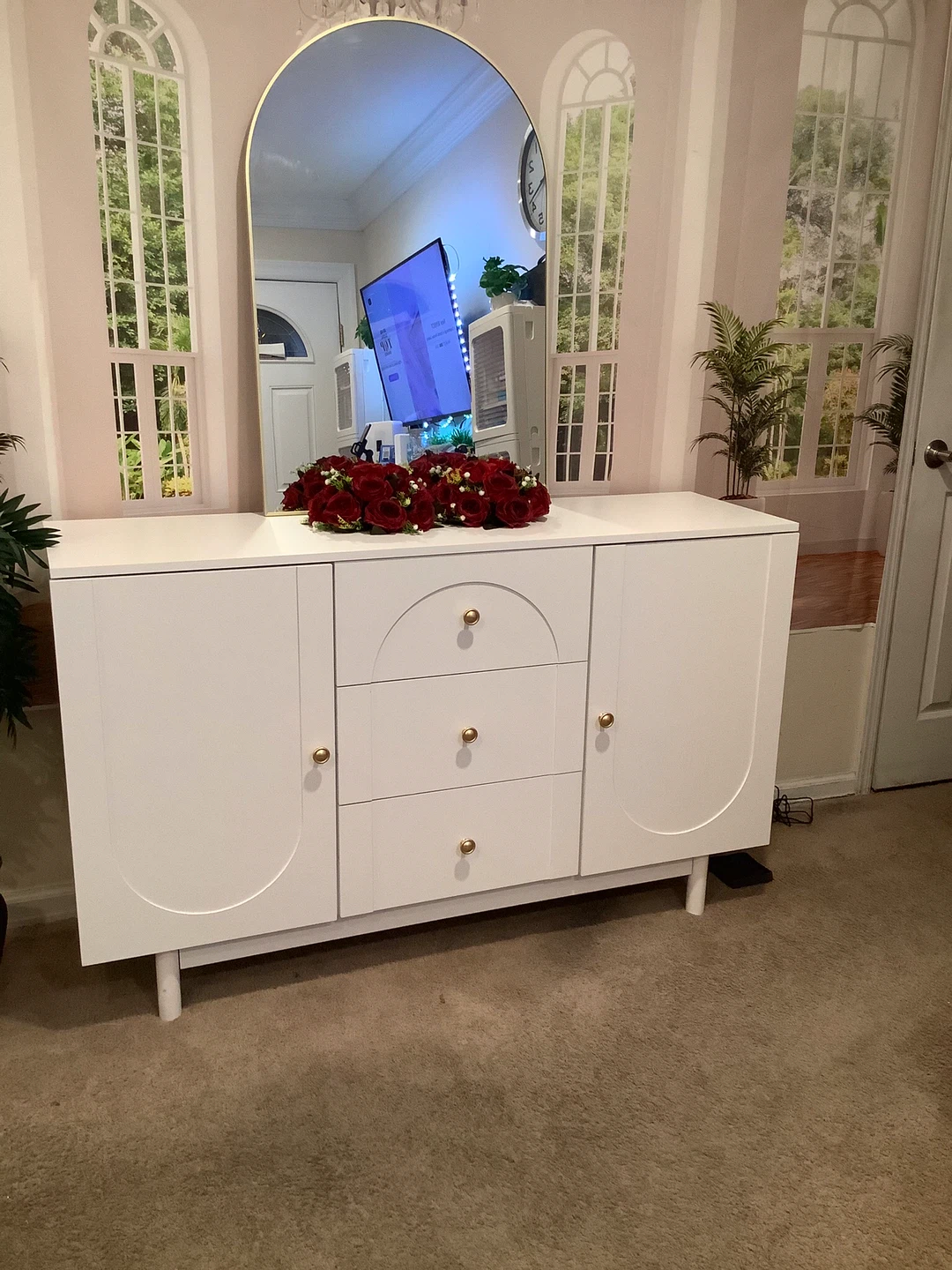 White Sideboar height 33 inches width 54 inches depth 16 inches.