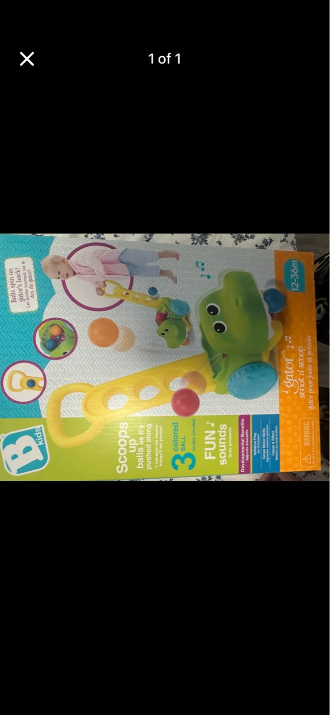 B. Toys Gator Scoot 'n' Scoop Push Toy