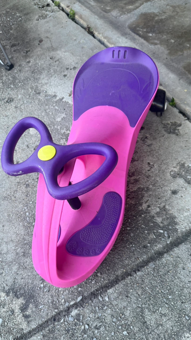 Pink and Purple Ride On Swivel Car