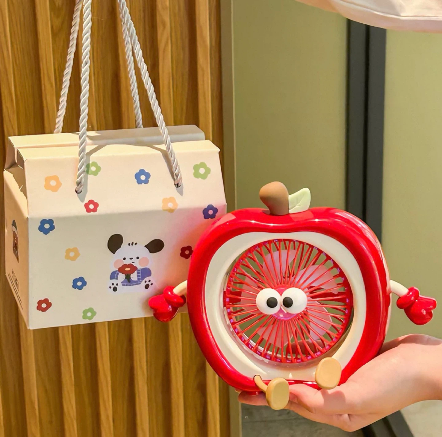 Apple-style handheld mini fan