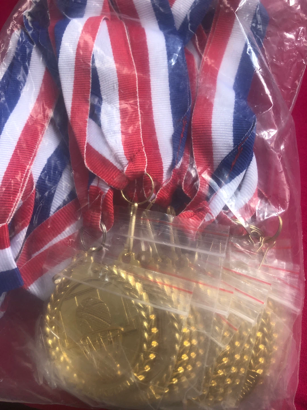 Gold Medals with Red, White, and Blue Ribbons