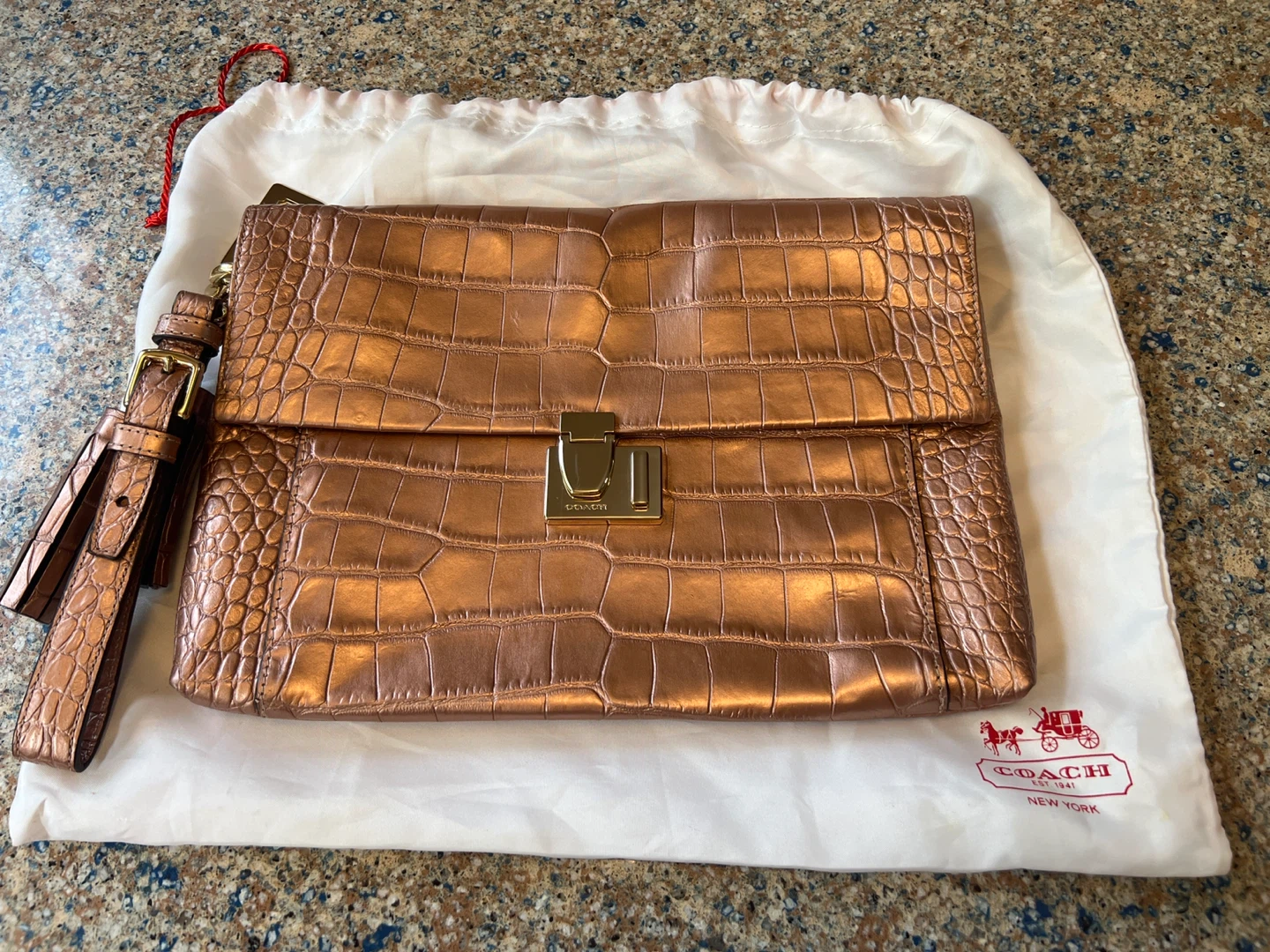 COACH Rose Gold Embossed Leather Clutch Wristlet