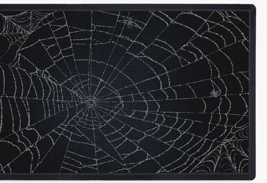 Ruggable spider web rug