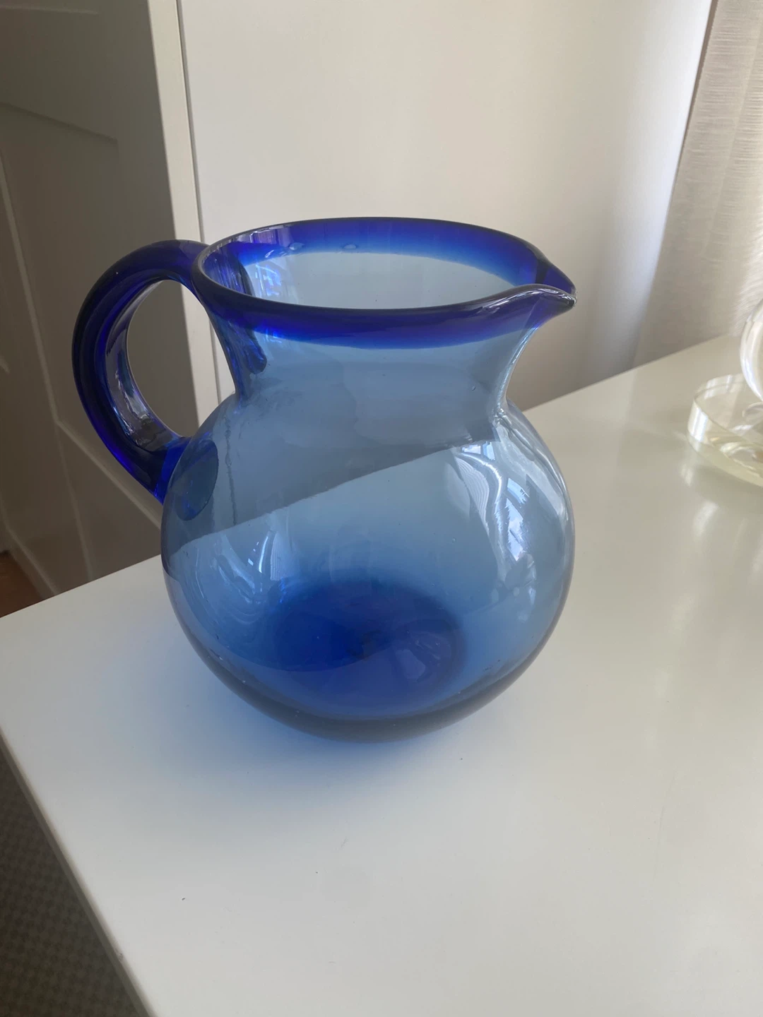 Pier 1 Imports Blue glass pitcher