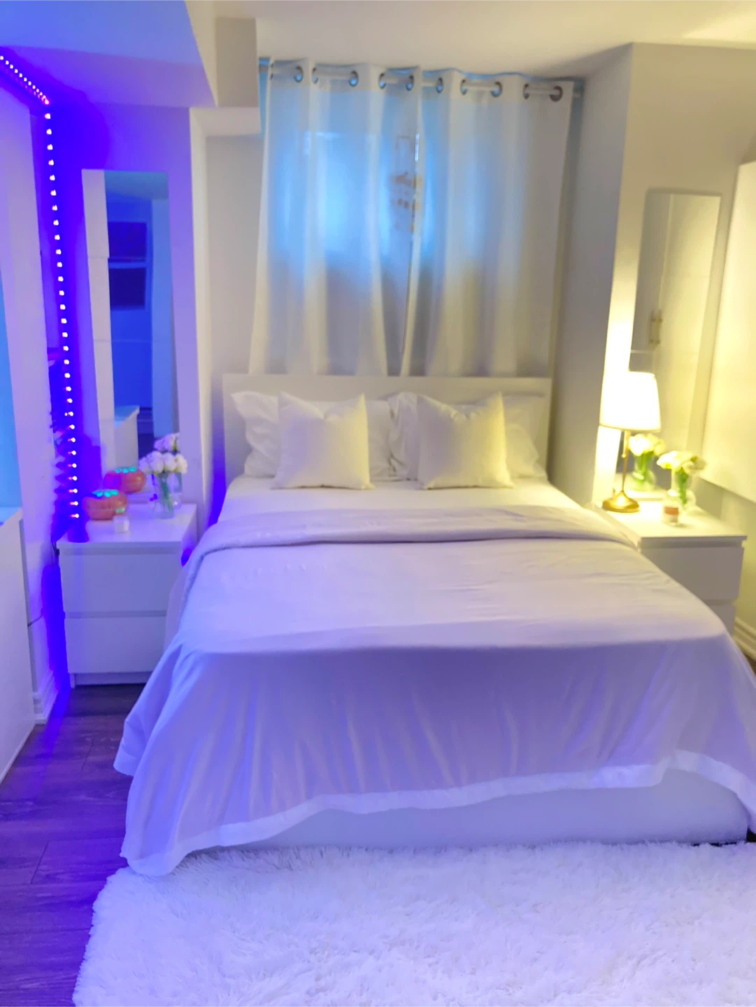 White Bed Frame with Duvet and Pillows