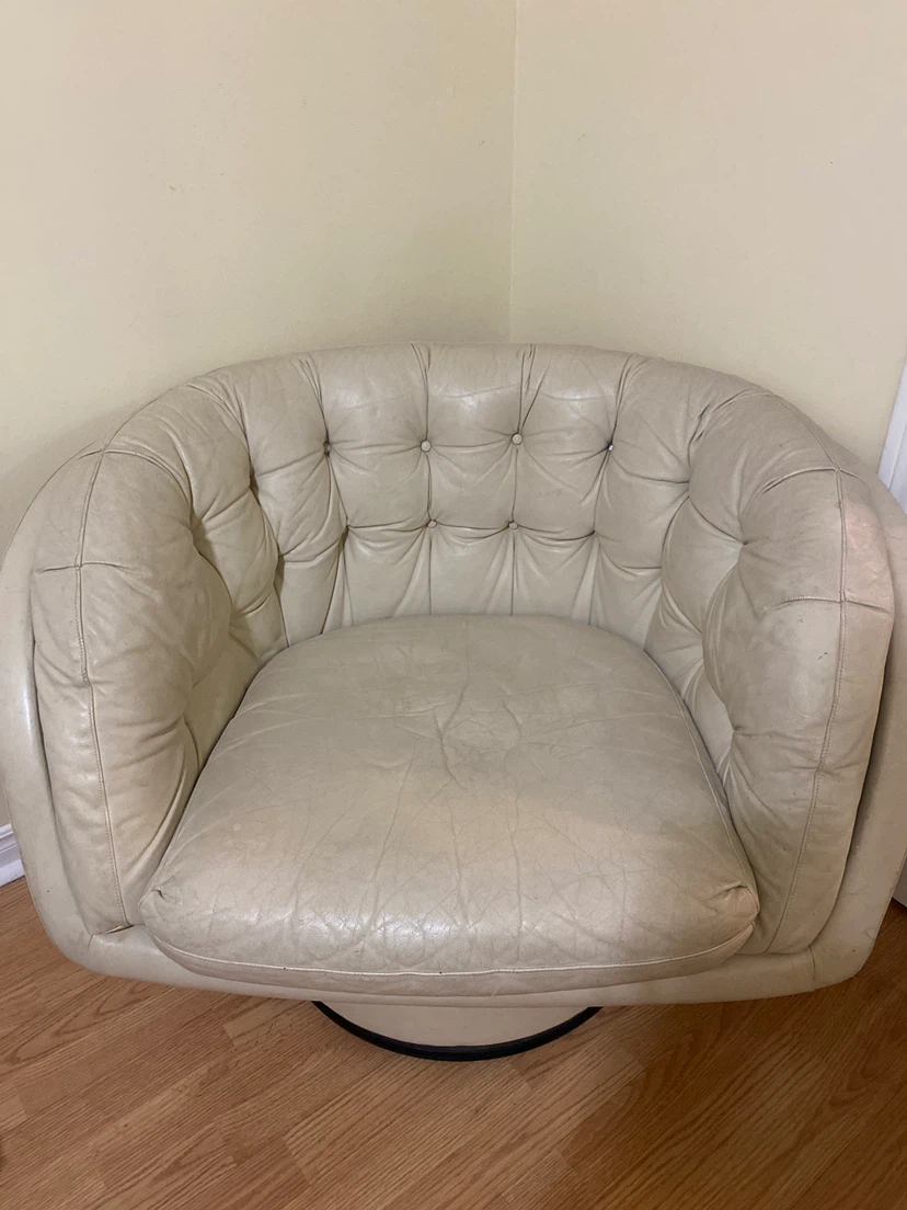 Cream Tufted Swivel Armchair