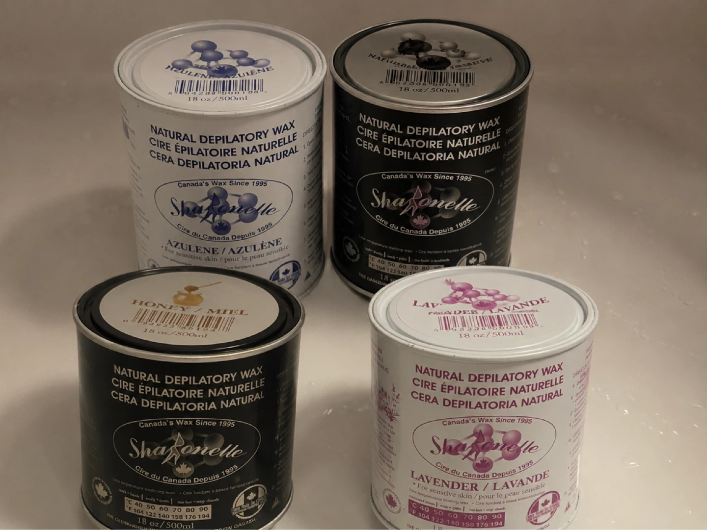 4 soft wax cans