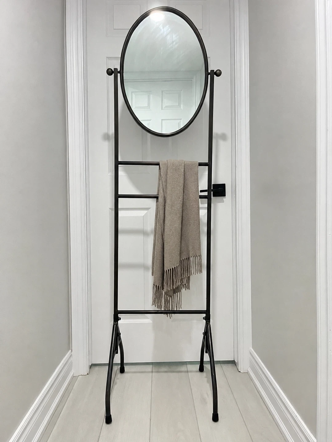 Oval Mirror on Display Stand