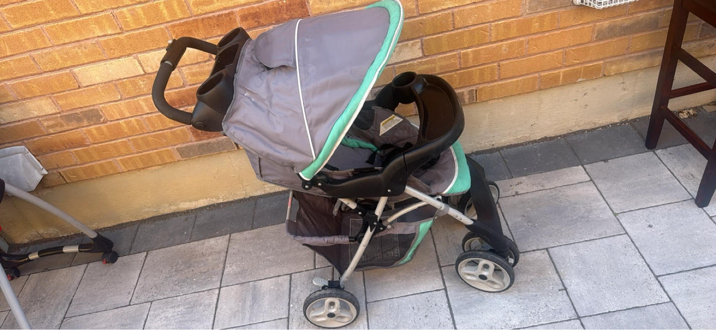 Grey and Green Baby Stroller