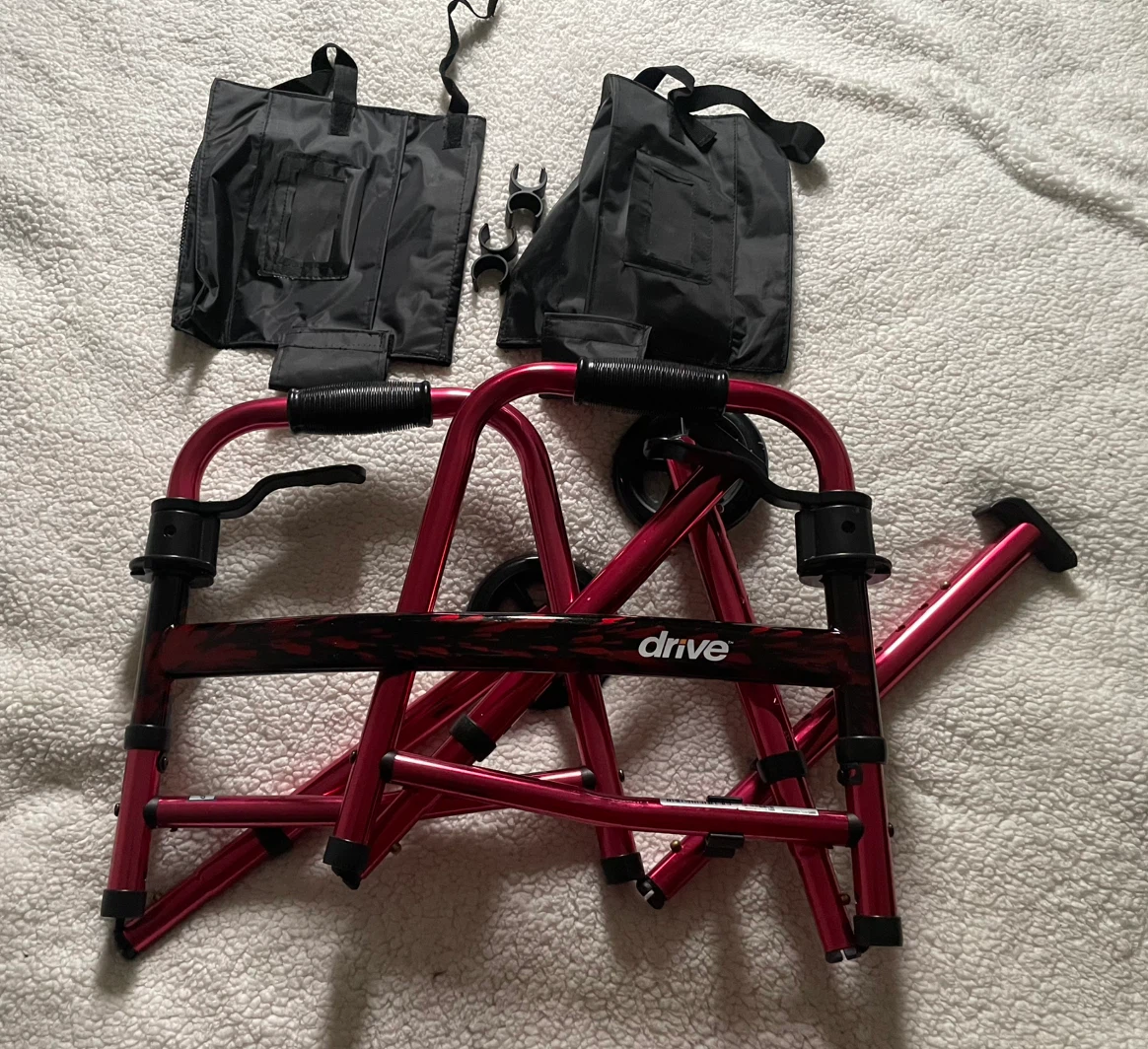 Walker with Bag and a pair of crutches
