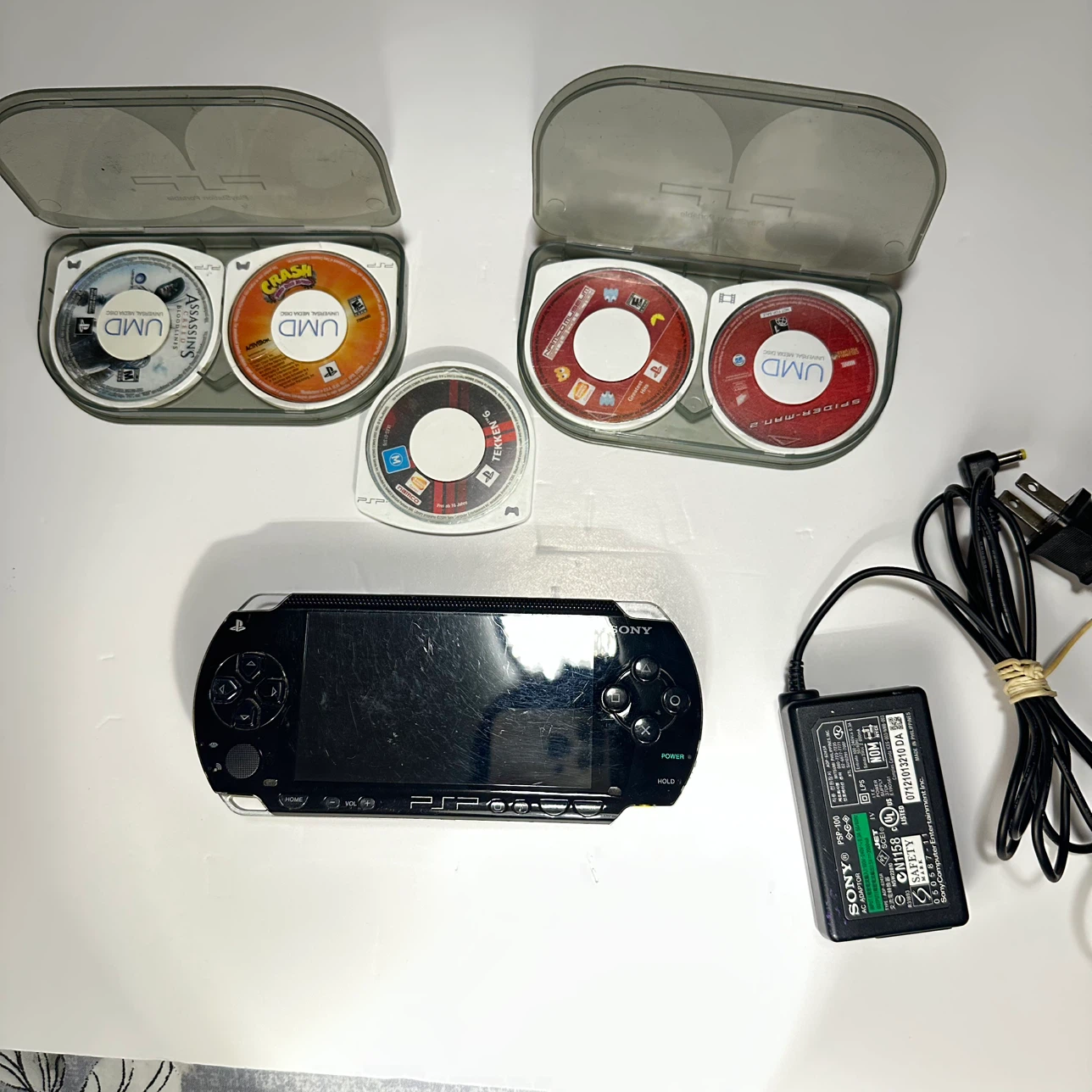 Sony psp fat 1001 with 6 games 4gb memory card