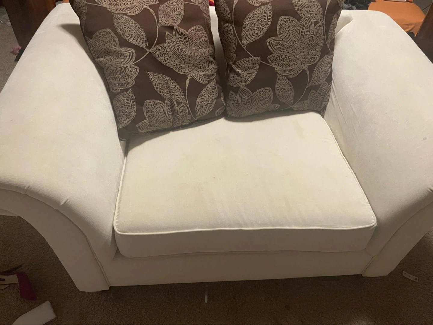Cream Loveseat with Floral Accent Pillows