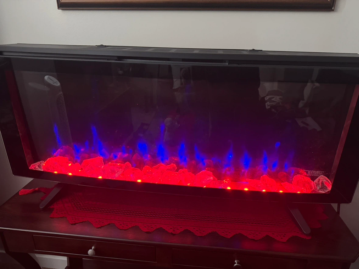 Electric Fireplace , 48 inch on stand with Remote. - photo 2