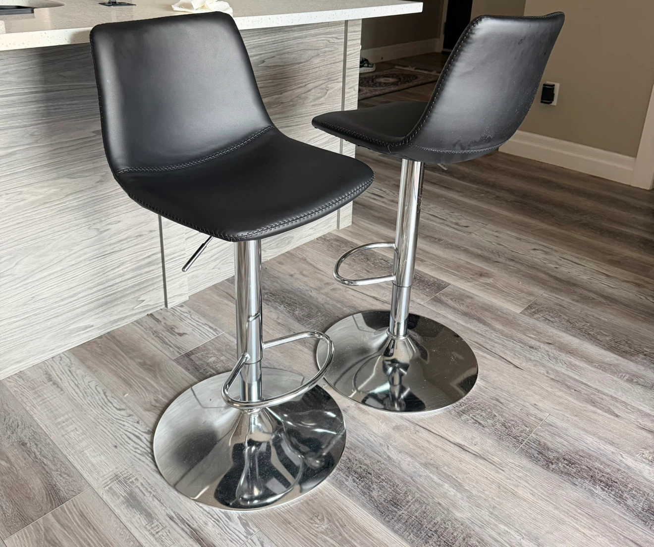 Black Faux Leather Adjustable Bar Stools (Set of 2)