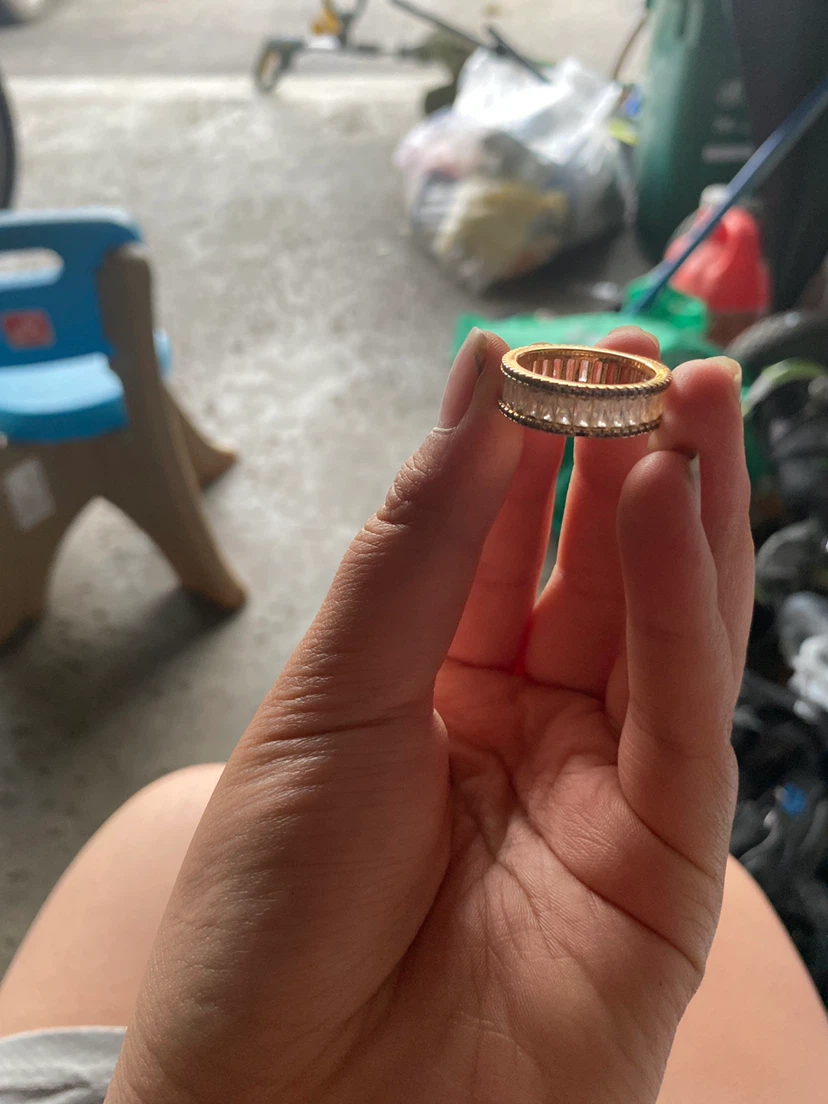 Gold-tone band ring with clear stones