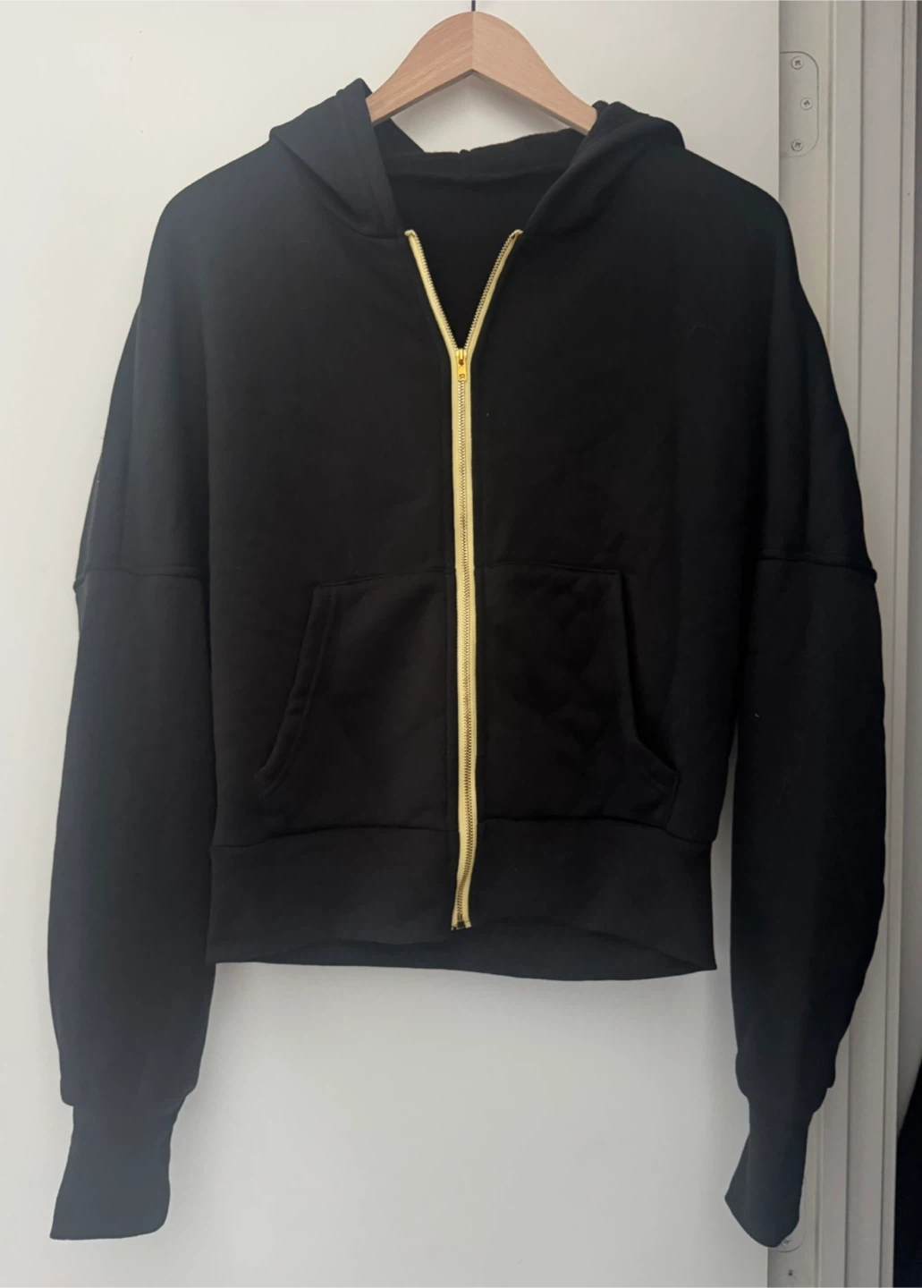 LIKE NEW oversized black hoodie with gold trim size medium ⚽️