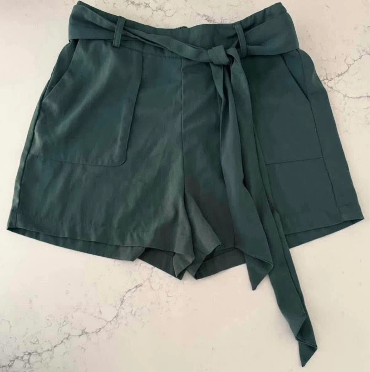 LIKE NEW Free People teal front tie shorts size small